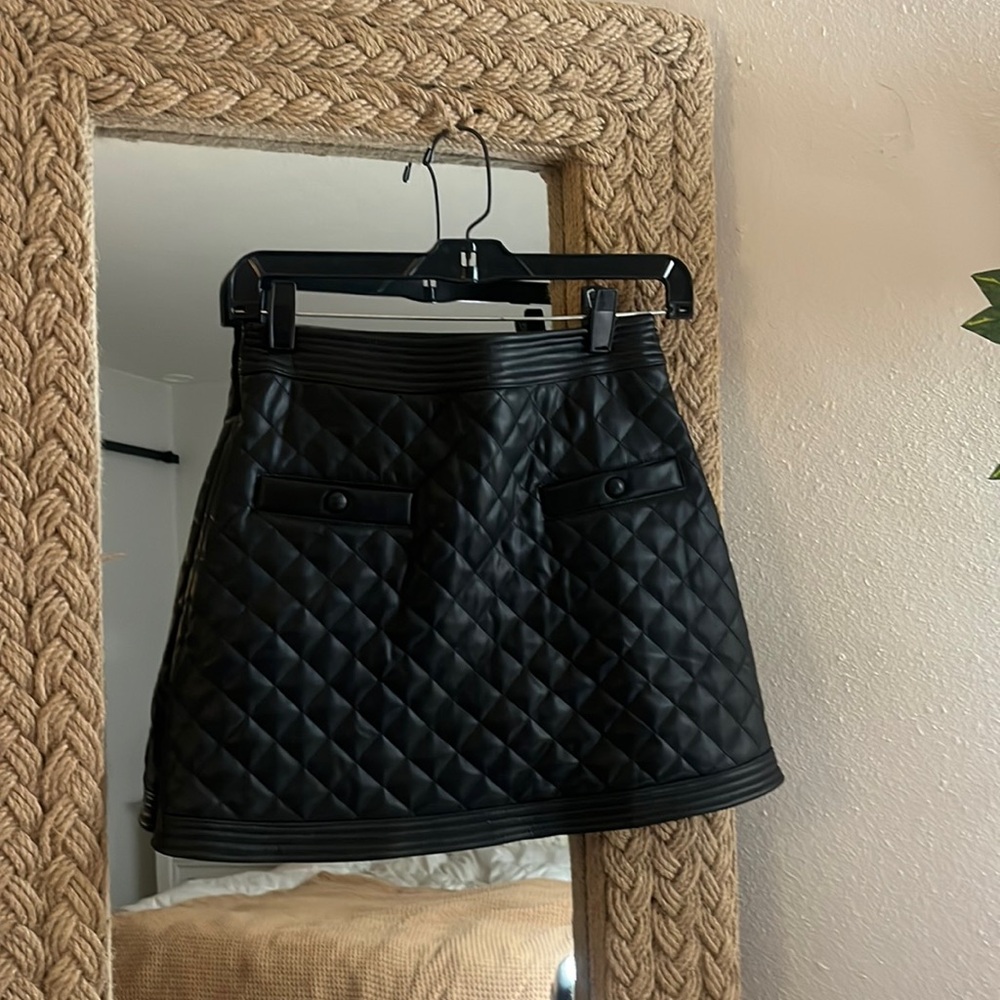 AQUA black faux leather quilted mini skirt